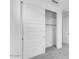 Spacious closet featuring a sliding door and built-in shelving for optimal organization and storage solutions at 5851 S Romano --, Mesa, AZ 85212
