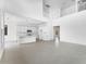 Open-concept living space with kitchen view, soaring ceilings, and modern design at 5851 S Romano --, Mesa, AZ 85212