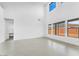 Bright and airy living room featuring tile flooring and large windows at 5851 S Romano --, Mesa, AZ 85212