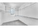 Bright walk-in closet with soft carpet, built-in shelving, and a well-organized space for clothes and accessories at 5851 S Romano --, Mesa, AZ 85212