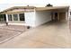 Well-maintained single-story home with convenient covered parking at 8257 E Dutchman Dr, Mesa, AZ 85208