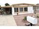 Inviting single-story home with a covered patio perfect for outdoor seating at 8257 E Dutchman Dr, Mesa, AZ 85208