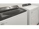 Laundry room features a new washer and dryer at 16034 W Desert Hollow Dr, Surprise, AZ 85387
