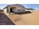 Backyard with neutral dirt at 16062 W Prickly Pear Trl, Surprise, AZ 85387