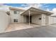 Exterior view of the home with a covered carport and ample parking space at 4937 N Granite Reef Rd, Scottsdale, AZ 85251