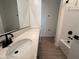 Modern bathroom with a vanity, bathtub, and tile flooring at 4267 E Bradford Ave, San Tan Valley, AZ 85143