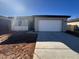 New construction home with two-car garage and neutral exterior finishes at 4267 E Bradford Ave, San Tan Valley, AZ 85143