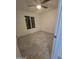 Well-lit bedroom featuring wood-look floors at 6943 W Monterey Way, Phoenix, AZ 85033