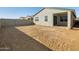 Landscaped backyard with block wall at 9121 N 173Rd Ln, Waddell, AZ 85355