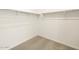 Spacious corner closet with double hanging rods at 9121 N 173Rd Ln, Waddell, AZ 85355