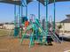 Modern playground equipment under shade structures at 9121 N 173Rd Ln, Waddell, AZ 85355