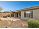 Rear exterior of home with covered patio and barbecue great for entertaining at 2740 W Plum Hollow Dr, Anthem, AZ 85086