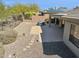 Desert backyard featuring a covered patio area, perfect for outdoor entertaining at 2740 W Plum Hollow Dr, Anthem, AZ 85086