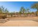 Desert landscaped backyard and low block fence offer privacy and nice views at 2740 W Plum Hollow Dr, Anthem, AZ 85086