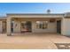 Covered patio featuring ceiling fan, flat screen tv, and access to the backyard at 2740 W Plum Hollow Dr, Anthem, AZ 85086