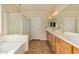 Double vanity bathroom with soaking tub and shower at 30341 N Saddlebag Ln, San Tan Valley, AZ 85143