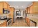 Kitchen with stainless steel appliances and breakfast nook at 30341 N Saddlebag Ln, San Tan Valley, AZ 85143