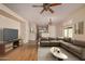 Spacious living room with a neutral color scheme and hardwood floors at 30341 N Saddlebag Ln, San Tan Valley, AZ 85143