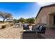 Outdoor patio with seating area and views of the backyard at 30341 N Saddlebag Ln, San Tan Valley, AZ 85143