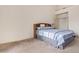 Spacious bedroom with carpeted floors and gray bedding at 4850 W Erie St, Chandler, AZ 85226