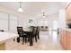 Open dining area with a table and chairs, adjacent to the kitchen at 15881 W Moreland W St, Goodyear, AZ 85338