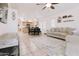 Open concept Gathering room with a view of the kitchen and dining area at 15881 W Moreland W St, Goodyear, AZ 85338