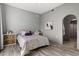 Well-lit bedroom featuring a comfortable queen bed and tasteful decor to make it a calming space at 5311 N Palo Cristi Rd, Paradise Valley, AZ 85253