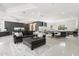 Open-concept living room with a modern kitchen and dining area that feature modern decor at 5311 N Palo Cristi Rd, Paradise Valley, AZ 85253