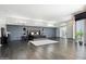 Expansive main bedroom with dark hardwood flooring and contemporary decor at 5311 N Palo Cristi Rd, Paradise Valley, AZ 85253