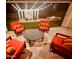 Relaxing backyard patio with fire pit, seating area, and string lights at 7369 W Cactus Wren Way, Florence, AZ 85132