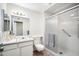 Clean bathroom with a shower/tub combo and white vanity at 10606 W Granada Dr, Sun City, AZ 85373