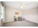 Bright bedroom with carpet flooring and a ceiling fan at 10606 W Granada Dr, Sun City, AZ 85373