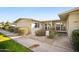 Attractive exterior of condo with well-manicured landscaping at 10606 W Granada Dr, Sun City, AZ 85373