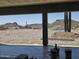 View from the porch of a new home build on a large lot with desert mountain views at 1907 W Brooke Ln, Queen Creek, AZ 85144