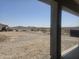 View from a modern home of construction on a large lot with mountain views in the distance at 1907 W Brooke Ln, Queen Creek, AZ 85144