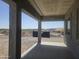Covered patio overlooking a desert landscape with mountain views at 1907 W Brooke Ln, Queen Creek, AZ 85144