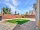 Serene backyard featuring a putting green, lush landscaping, and a tranquil atmosphere for outdoor enjoyment at 8450 E Montecito Ave, Scottsdale, AZ 85251