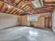 Spacious garage with ample storage cabinets and concrete flooring, perfect for parking and organizing at 8450 E Montecito Ave, Scottsdale, AZ 85251