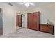 Bright bedroom with mirrored closet and murphy bed at 17963 W Ryans Way, Surprise, AZ 85374