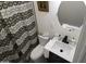 Clean bathroom with shower, toilet, and vanity with modern fixtures at 418 W Hartford Rd, Kearny, AZ 85137