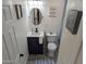 Updated bathroom with a dark vanity and blue shower curtain at 418 W Hartford Rd, Kearny, AZ 85137