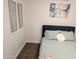 Spacious bedroom with a double bed, featuring soft color tones at 418 W Hartford Rd, Kearny, AZ 85137