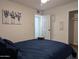 Spacious bedroom with a double bed and closet at 418 W Hartford Rd, Kearny, AZ 85137