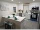 Updated kitchen with white shaker cabinets and quartz countertops at 418 W Hartford Rd, Kearny, AZ 85137