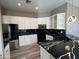 Stylish kitchen featuring white cabinets and quartz countertops at 647 N Cambridge St, Gilbert, AZ 85233