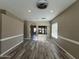 Spacious living room with wood floors and stylish ceiling fan at 647 N Cambridge St, Gilbert, AZ 85233