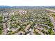 An aerial view showcases the community's lush landscaping and convenient location at 15380 N 100Th St # 1106, Scottsdale, AZ 85260