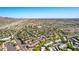 Panoramic aerial view of a well-planned community with lush landscaping, various housing, and convenient road networks at 15380 N 100Th St # 1106, Scottsdale, AZ 85260