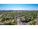 Aerial view of a residential neighborhood, featuring well-maintained homes, lush landscaping, and mature trees at 15380 N 100Th St # 1106, Scottsdale, AZ 85260