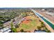 Aerial view of baseball fields with parking lot, community center and walking paths at 15380 N 100Th St # 1106, Scottsdale, AZ 85260
